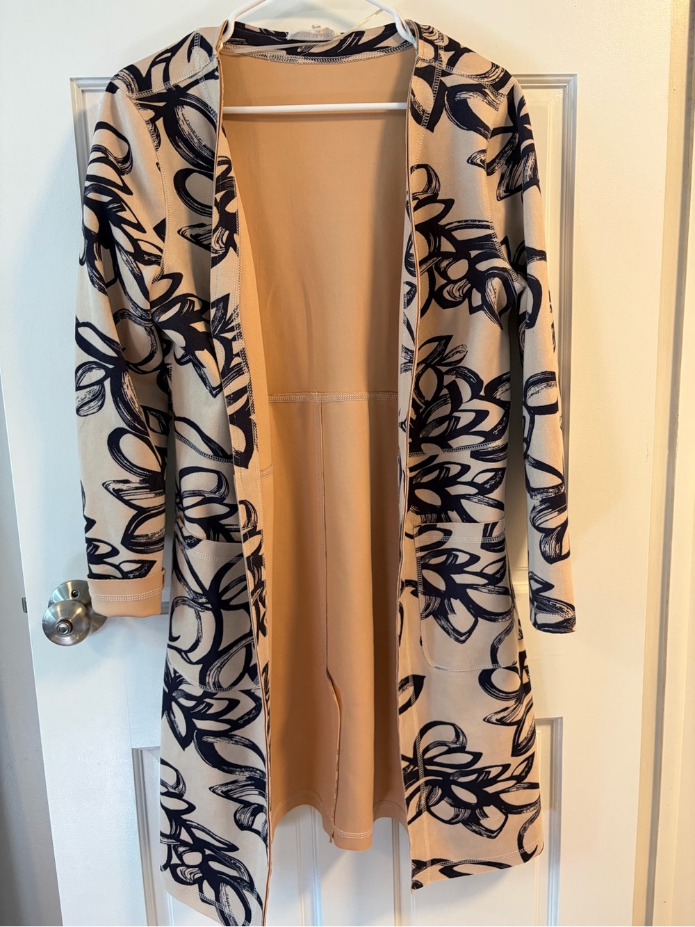 Solitaire Beige Top with Red Logo Tag